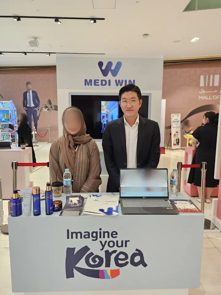 MEDIWIN CEO at the MEDIWIN booth at a medical tourism event in the Middle East
